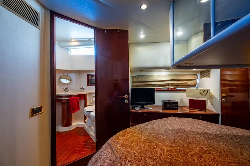 You Go Girl! Yacht Photos Pics Luxurious cabin interior of 2000 Fairline Squadron 52 yacht with ensuite bathroom.