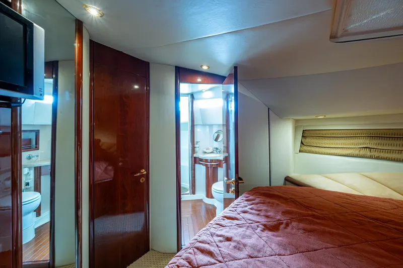 You Go Girl! Yacht Photos Pics Luxurious cabin interior of 2000 Fairline Squadron 52 yacht with en-suite bathroom.