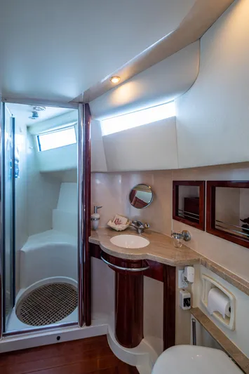 You Go Girl! Yacht Photos Pics Luxurious bathroom in 2000 Fairline Squadron 52 yacht with modern fixtures and shower.