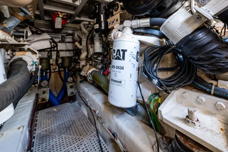 You Go Girl! Yacht Photos Pics Engine room of 2000 Fairline Squadron 52 yacht, featuring mechanical components and wiring.