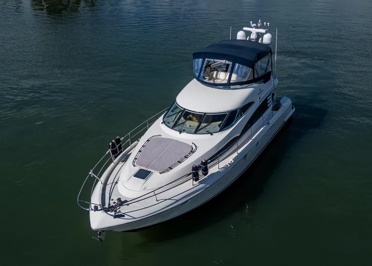 You Go Girl! Yacht Photos Pics Fairline Squadron 52 yacht, 2000 model, cruising on calm waters.