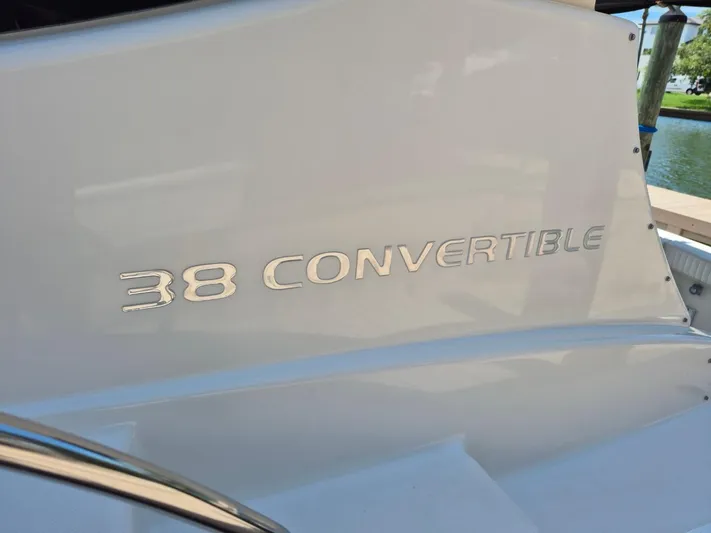 Freebyrd II Yacht Photos Pics 2002 Silverton 38 Convertible boat nameplate in sleek metallic lettering.