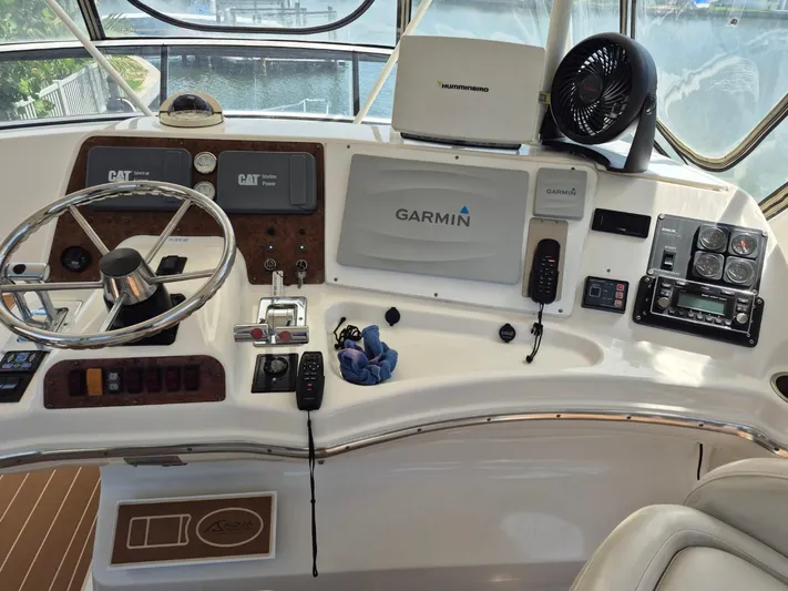 Freebyrd II Yacht Photos Pics Helm of 2002 Silverton 38 Convertible with Garmin navigation and control instruments.