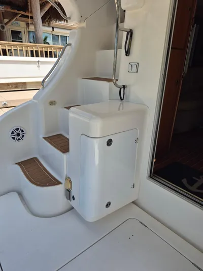 Freebyrd II Yacht Photos Pics 2002 Silverton 38 Convertible boat interior stairs and storage compartment.