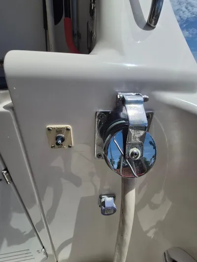 Freebyrd II Yacht Photos Pics Close-up of a 2002 Silverton 38 Convertible boat's deck fittings and controls.