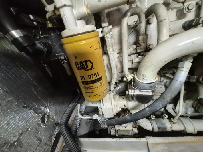 Freebyrd II Yacht Photos Pics Engine compartment of a 2002 Silverton 38 Convertible with CAT fuel filter.