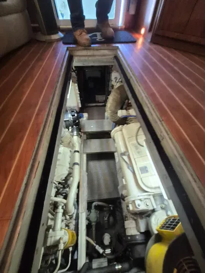 Freebyrd II Yacht Photos Pics Engine room of a 2002 Silverton 38 Convertible yacht with visible machinery.