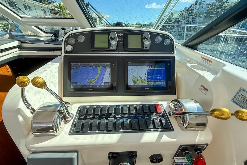 Yacht Photos Pics Cockpit of 2006 Tiara 3600 yacht with navigation controls and dual screens.