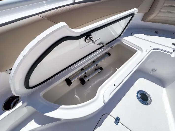  Yacht Photos Pics Open storage compartment on 2025 Edgewater 325CC boat, showcasing sleek design and functionality.