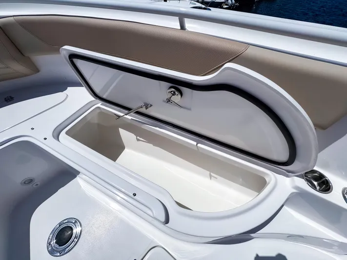  Yacht Photos Pics Open storage compartment on 2025 Edgewater 325CC boat, featuring sleek design and ample space.