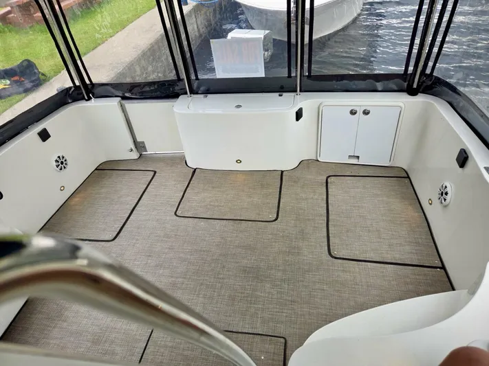  Yacht Photos Pics 2005 Carver 38 Super Sport boat interior with spacious deck and storage compartments.