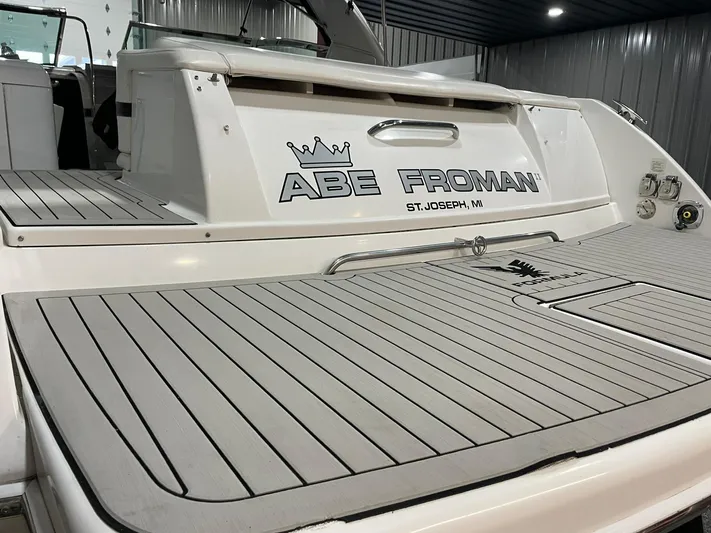 "abe Froman" Yacht Photos Pics 2006 Formula 330 Sun Sport boat with "Abe Froman" name, docked indoors.