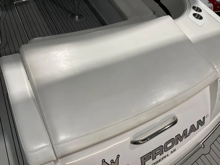 "abe Froman" Yacht Photos Pics 2006 Formula 330 Sun Sport boat with white seating and custom nameplate.