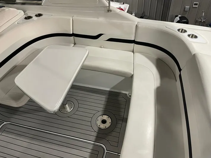 "abe Froman" Yacht Photos Pics 2006 Formula 330 Sun Sport boat interior with seating and table.