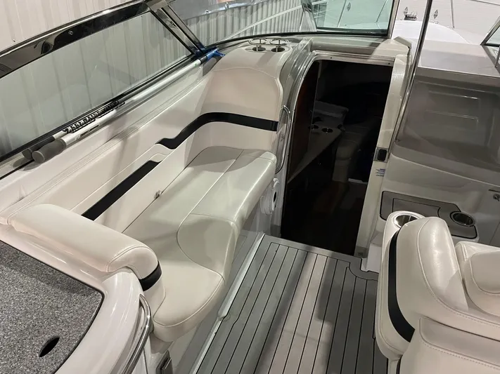 "abe Froman" Yacht Photos Pics 2006 Formula 330 Sun Sport boat interior with white seating and cabin entrance.