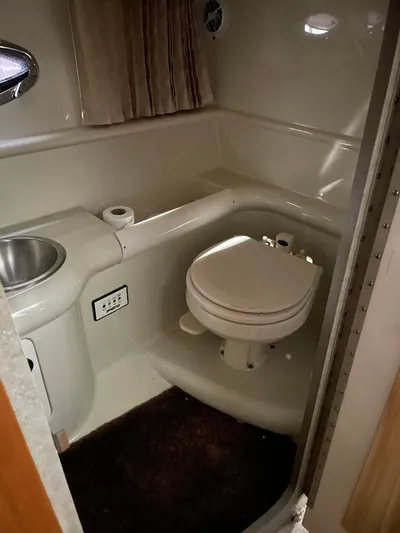 "abe Froman" Yacht Photos Pics 2006 Formula 330 Sun Sport boat bathroom with toilet and sink.