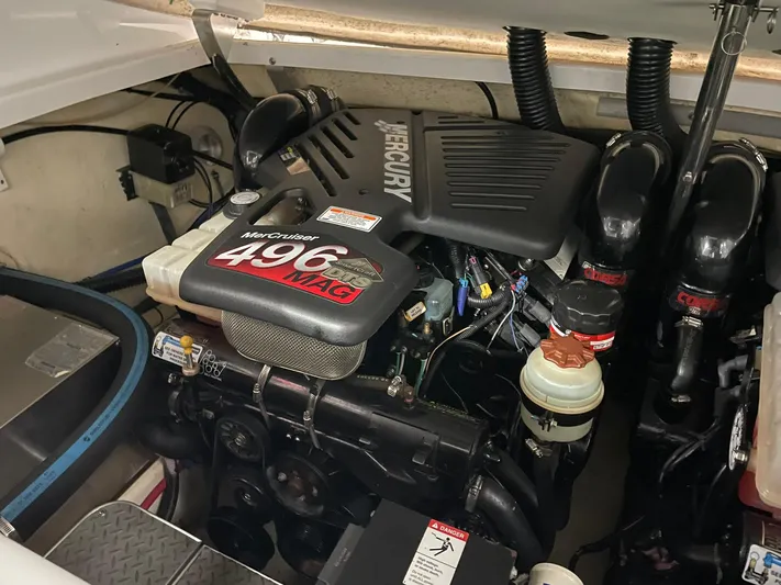 "abe Froman" Yacht Photos Pics 2006 Formula 330 Sun Sport engine compartment with Mercury MerCruiser 496 MAG engine.