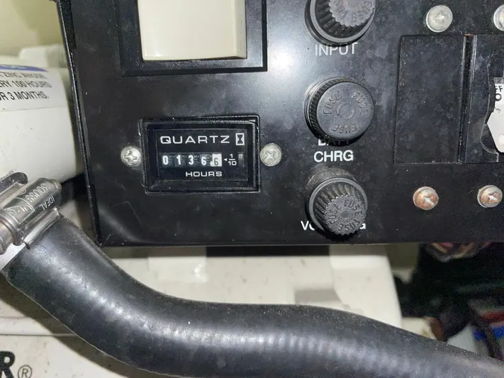 "abe Froman" Yacht Photos Pics Close-up of a 2006 Formula 330 Sun Sport engine hour meter showing 1365 hours.