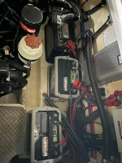 "abe Froman" Yacht Photos Pics 2006 Formula 330 Sun Sport engine compartment with batteries and wiring.