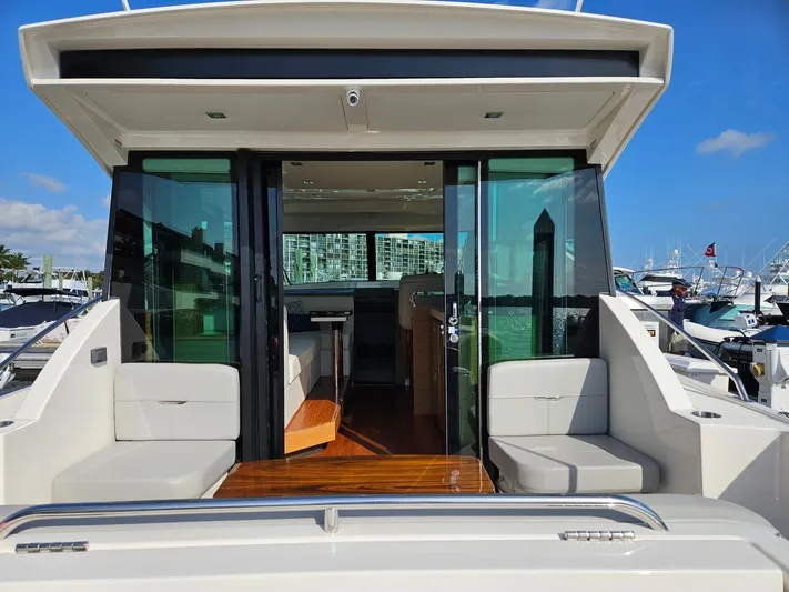  Yacht Photos Pics 2022 Tiara Yachts C39 Coupe with open cockpit and luxurious interior.