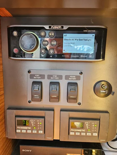  Yacht Photos Pics Control panel of a 2022 Tiara Yachts C39 Coupe with audio and battery switches.