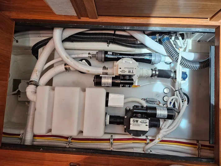  Yacht Photos Pics Engine compartment of 2022 Tiara Yachts C39 Coupe with visible hoses and components.