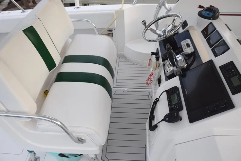 Cat Five Yacht Photos Pics Electric adjustable helm seat, Tech Dek flooring
