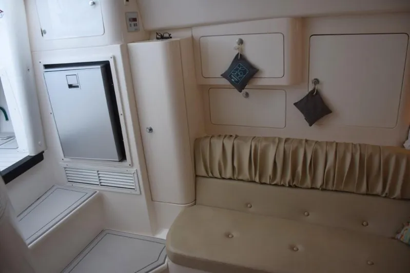 Cat Five Yacht Photos Pics Neat settee and cabinet storage, Cabin A/C