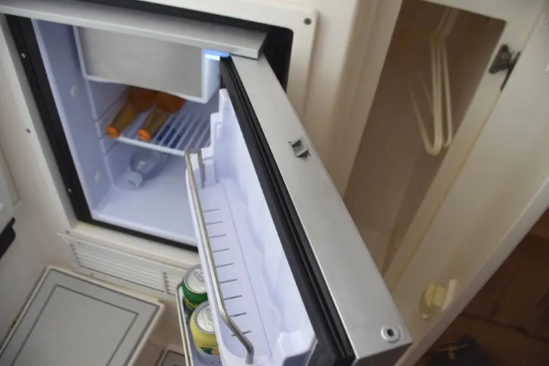 Cat Five Yacht Photos Pics Fridge with freezer section, hanging locker