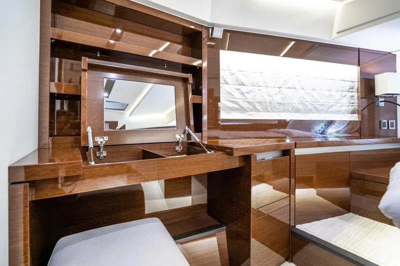 Compound Interest Yacht Photos Pics Luxurious interior of 2018 Prestige 630 Yacht with elegant wood finish and modern design.