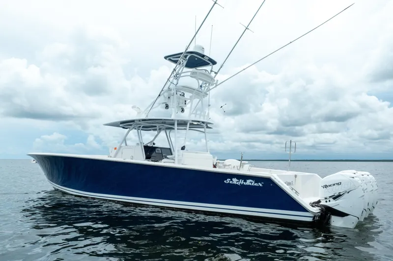  Yacht Photos Pics 2016 SeaHunter 45 boat on water, featuring sleek design and powerful engines.