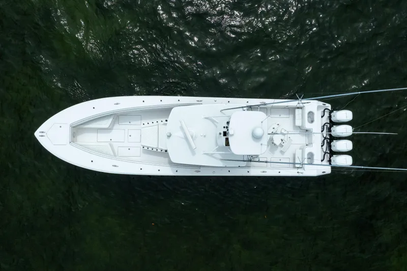 Yacht Photos Pics Overhead view of 2016 SeaHunter 45 boat on water, showcasing sleek design and powerful engines.