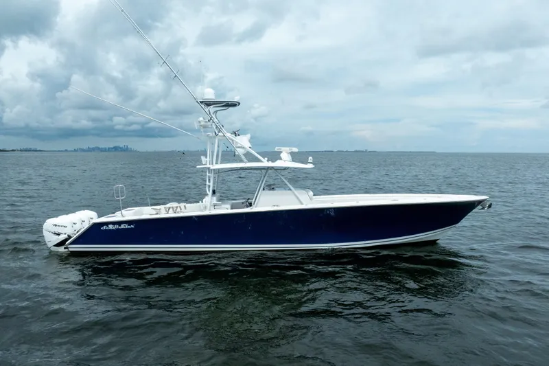  Yacht Photos Pics 2016 SeaHunter 45 boat on open water under cloudy skies.