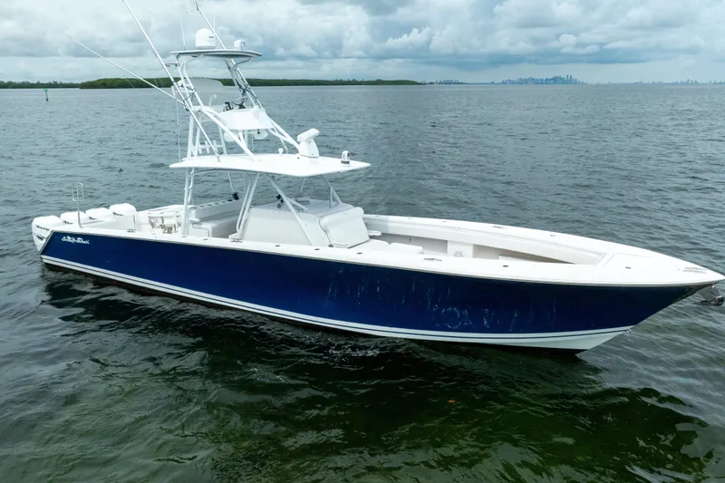  Yacht Photos Pics 2016 SeaHunter 45 boat with blue hull on open water under cloudy sky.