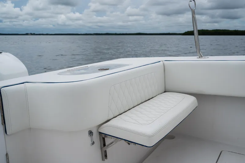  Yacht Photos Pics Luxurious seating on 2016 SeaHunter 45 boat with ocean view and cloudy sky.