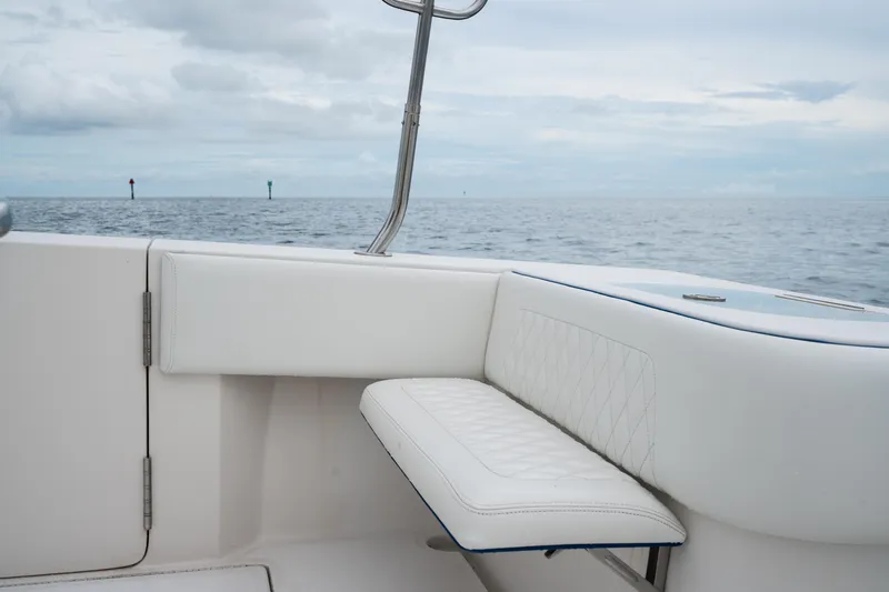  Yacht Photos Pics 2016 SeaHunter 45 boat interior with white seating, ocean view in background.