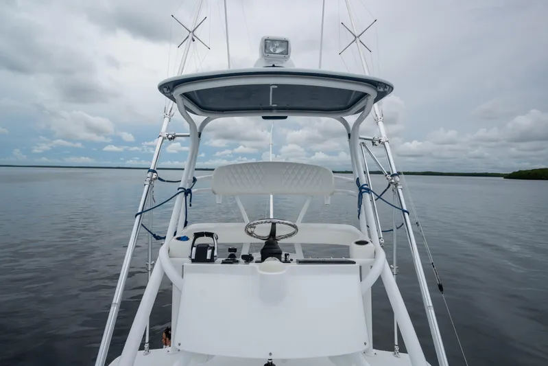  Yacht Photos Pics 2016 SeaHunter 45 boat helm with ocean view and cloudy sky.
