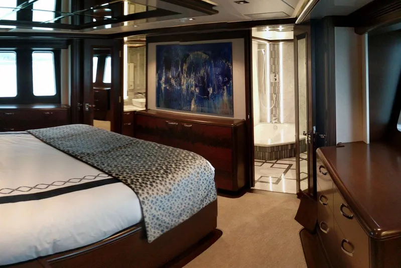  Yacht Photos Pics Luxurious 2017 Nordhavn 96 yacht bedroom with elegant decor and ensuite bathroom.