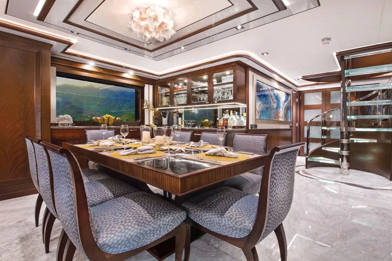 Yacht Photos Pics Luxurious dining area on a 2017 Nordhavn 96 yacht with elegant decor and modern furnishings.