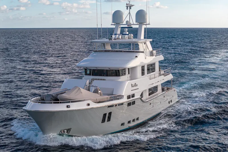  Yacht Photos Pics Luxurious 2017 Nordhavn 96 yacht cruising on open ocean waters.