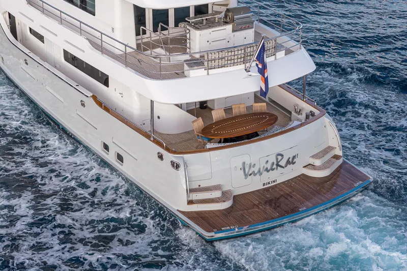  Yacht Photos Pics Luxurious 2017 Nordhavn 96 yacht cruising with elegant deck and dining area.