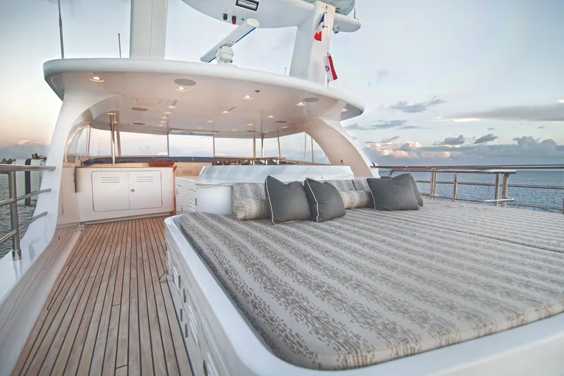  Yacht Photos Pics Luxurious 2017 Nordhavn 96 yacht deck with elegant seating and ocean view.