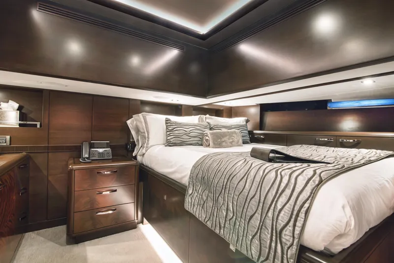  Yacht Photos Pics Luxurious 2017 Nordhavn 96 yacht bedroom with elegant wood finishes and modern decor.