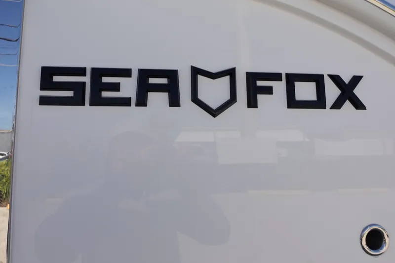  Yacht Photos Pics Sea Fox 328 Commander 2025 logo on boat exterior.