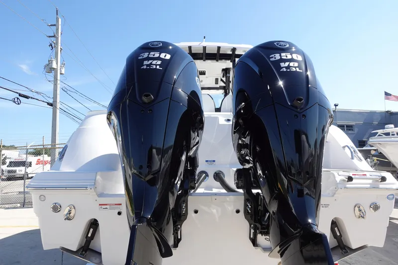  Yacht Photos Pics 2025 Sea Fox 328 Commander with twin 350 V6 engines, docked at a marina.