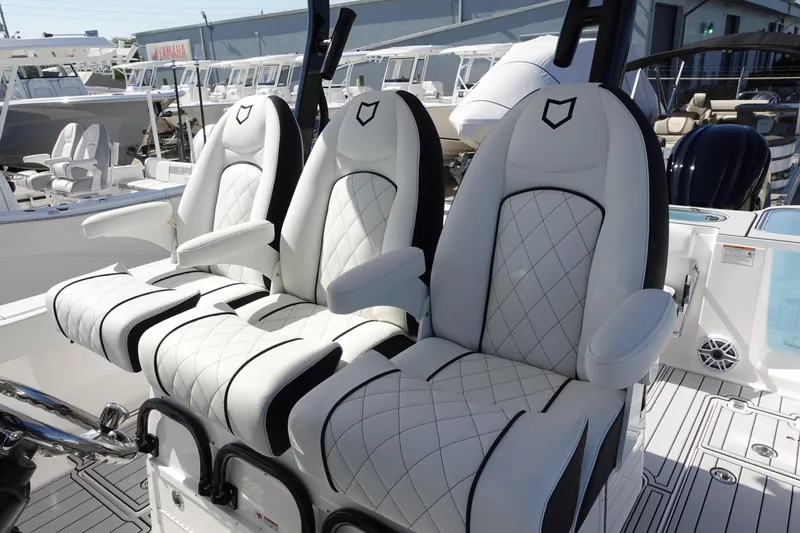  Yacht Photos Pics Luxurious seating on 2025 Sea Fox 328 Commander boat with diamond-stitched upholstery.