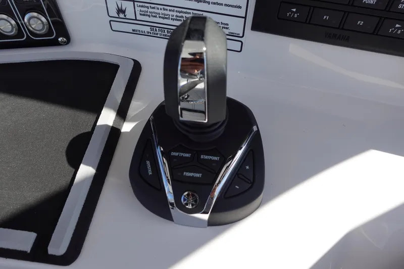  Yacht Photos Pics Control panel of 2025 Sea Fox 328 Commander boat with joystick and buttons.