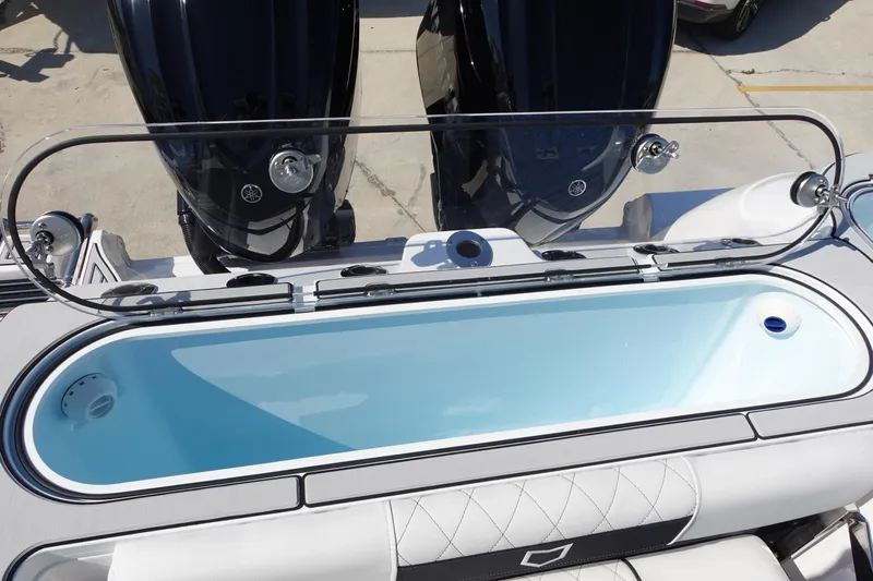  Yacht Photos Pics Sea Fox 328 Commander 2025 boat with dual outboard motors and spacious livewell.