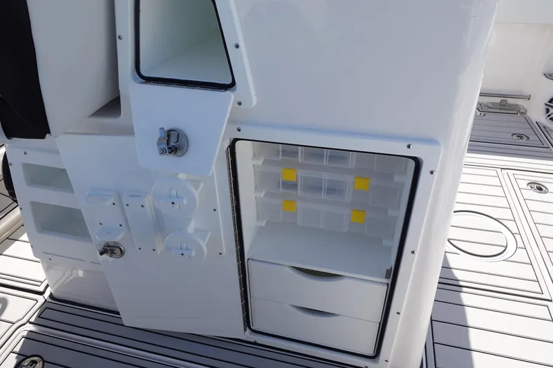  Yacht Photos Pics 2025 Sea Fox 328 Commander boat storage compartments with drawers and tackle boxes.