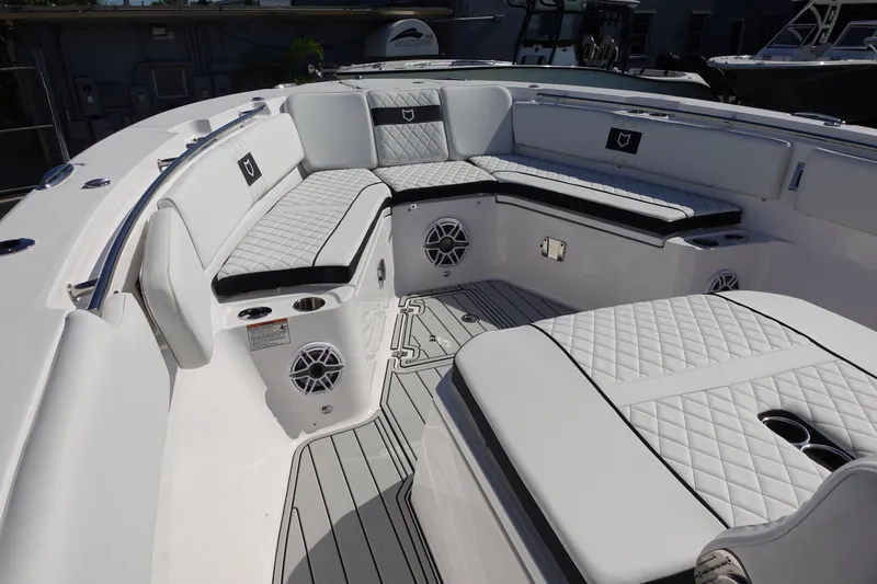  Yacht Photos Pics 2025 Sea Fox 328 Commander boat interior with luxurious seating and modern design.